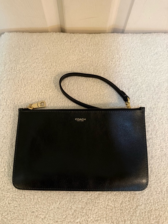 Coach Handbags - Coach Black Leather Wristlet with Gold Hardware
